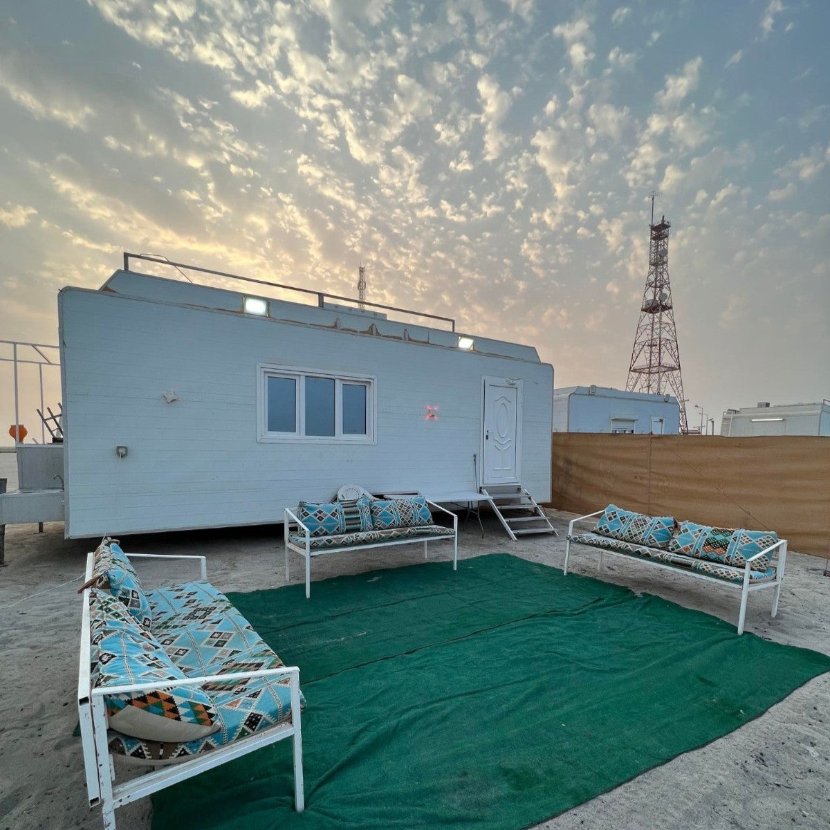 Relax by the sea in Al Ghariyeh Caravan (3) — a fully equipped beachfront caravan perfect for families and groups seeking a private oceanfront escape in Qatar.