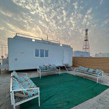 Relax by the sea in Al Ghariyeh Caravan (3) — a fully equipped beachfront caravan perfect for families and groups seeking a private oceanfront escape in Qatar.