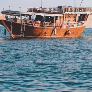 Enjoy jetskiing, banana rides, and a traditional BBQ feast aboard a Dhow in Qatar — the ultimate group experience for fun and relaxation at sea.