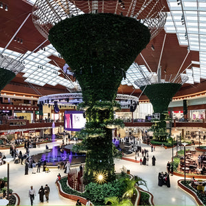 Visitors enjoying a luxury shopping experience in Doha, browsing high-end boutiques and exclusive stores.
