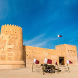 Historic village in Qatar, showcasing ancient architecture and scenic landscapes during the North of Qatar Historical Tour.