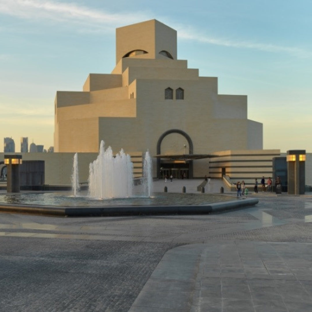 Private city tour car parked near Doha’s iconic Corniche, offering personalized sightseeing with a guide.