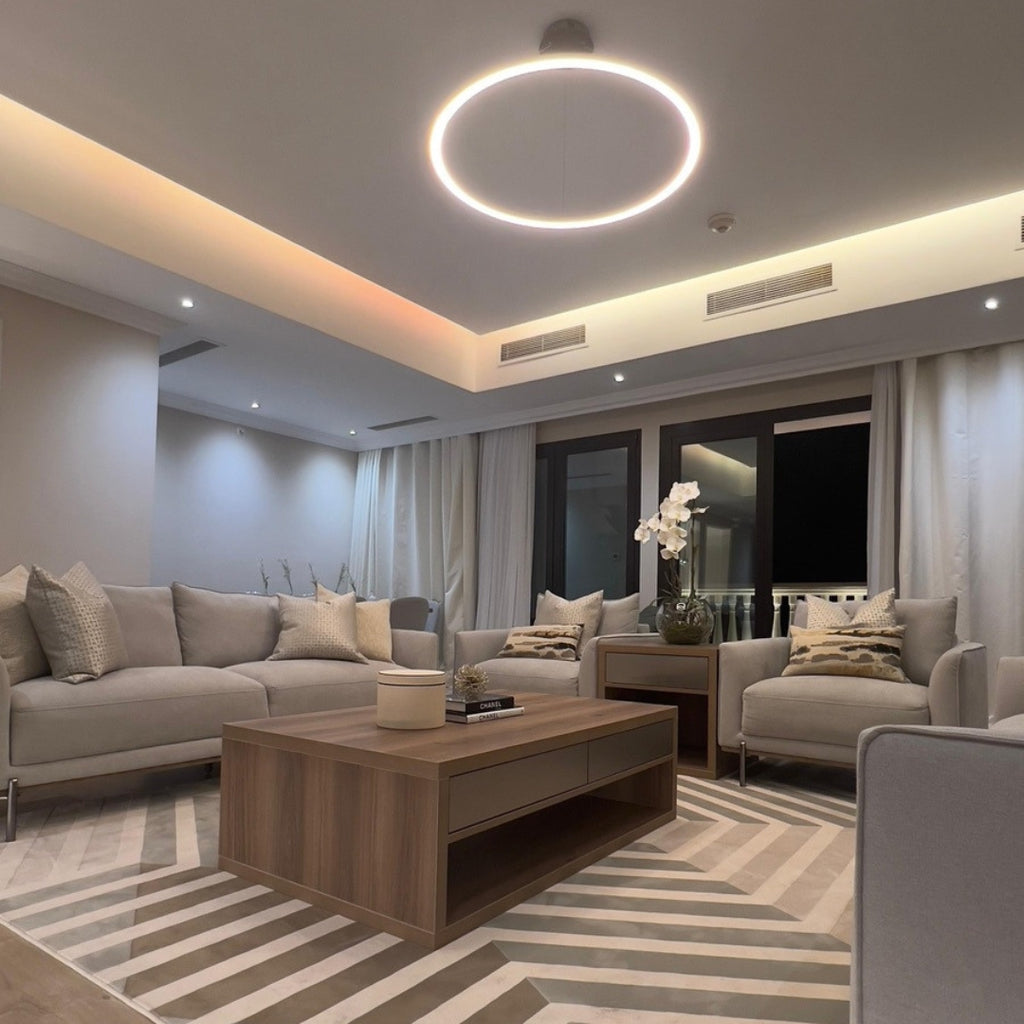Modern living area of The Key Apartment featuring stylish decor and cozy seating in Qatar.