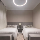 Bedroom view inside The Key Apartment with elegant lighting and a relaxing ambiance.